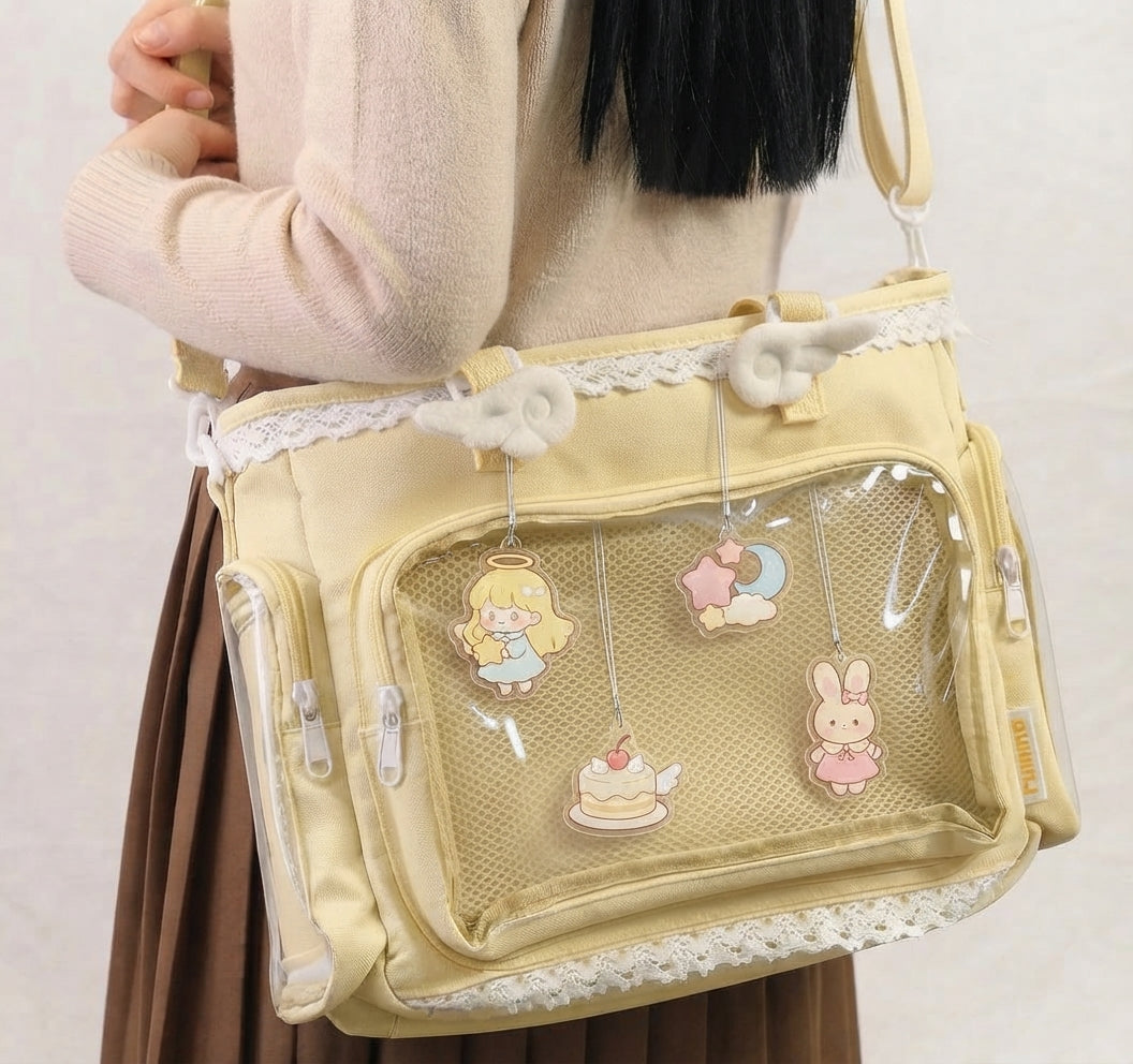 Acrylic charm ita bag display showing safe swing clearance around hanging keychains