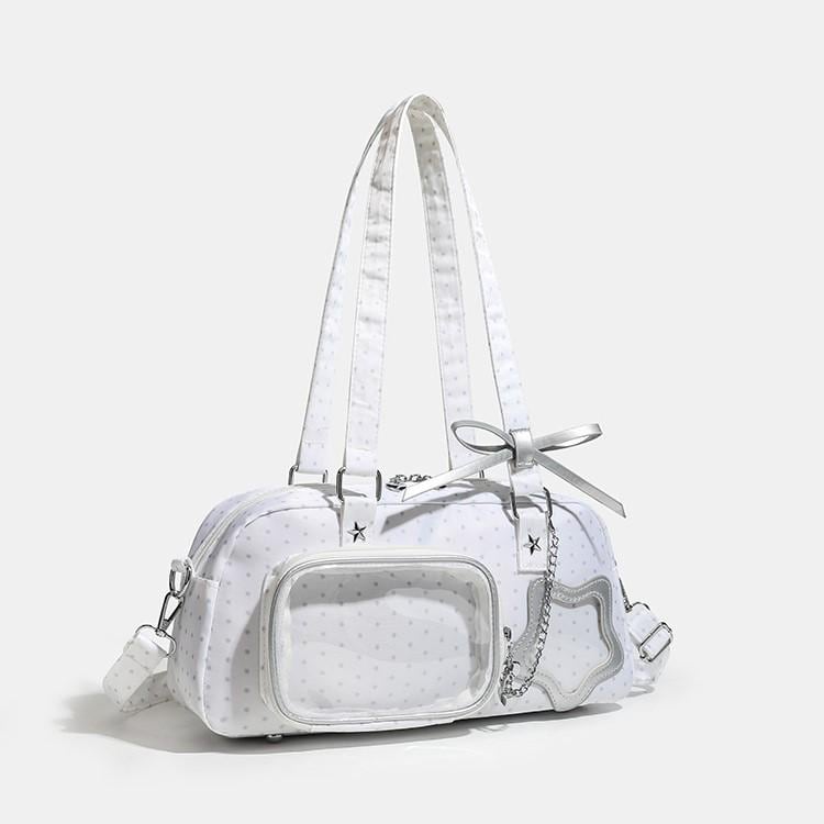 Sora Dual Window Shoulder Ita Bag lifestyle view showing shoulder carry and dual display windows