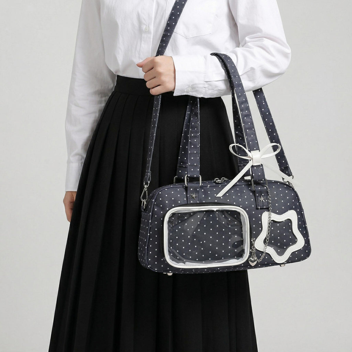 Sora Dual Window Shoulder Ita Bag front view showing rectangular display area and compact structured silhouette