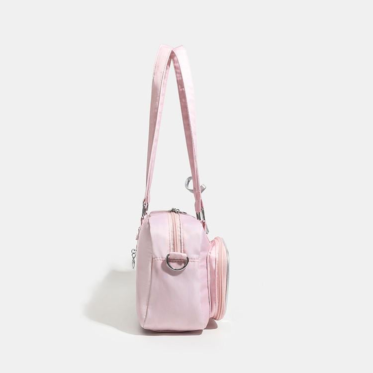 Sora Dual Window Shoulder Ita Bag alternate lifestyle view showing compact shape and star-shaped side window